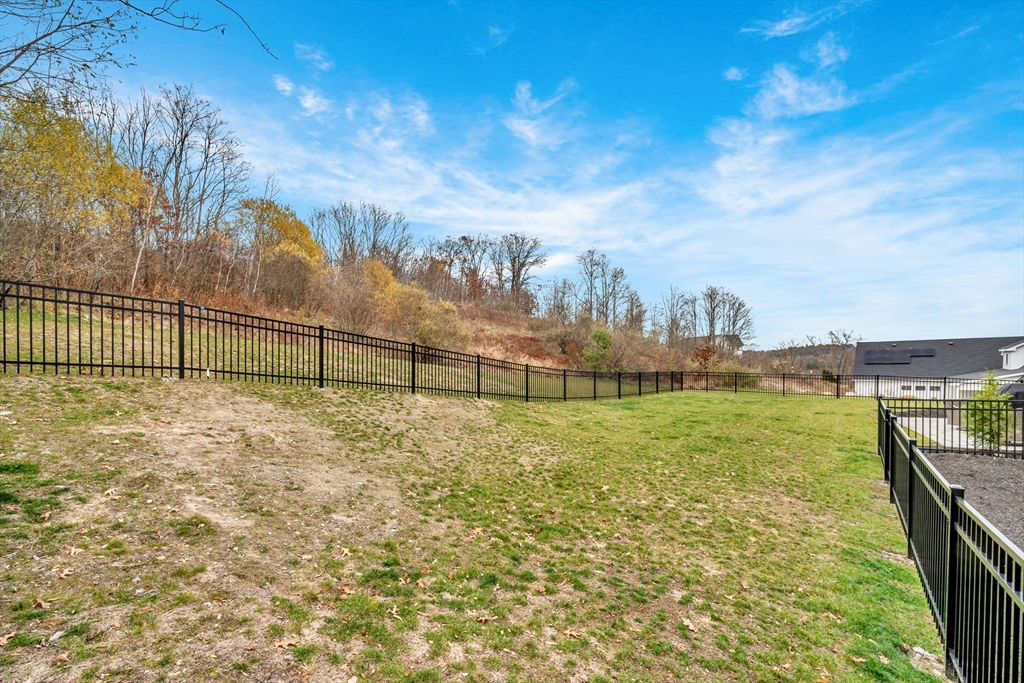 122 Seven Sister Road Haverhill, MA 01830 - Photo 29 of 33 a view of a yard with iron fence