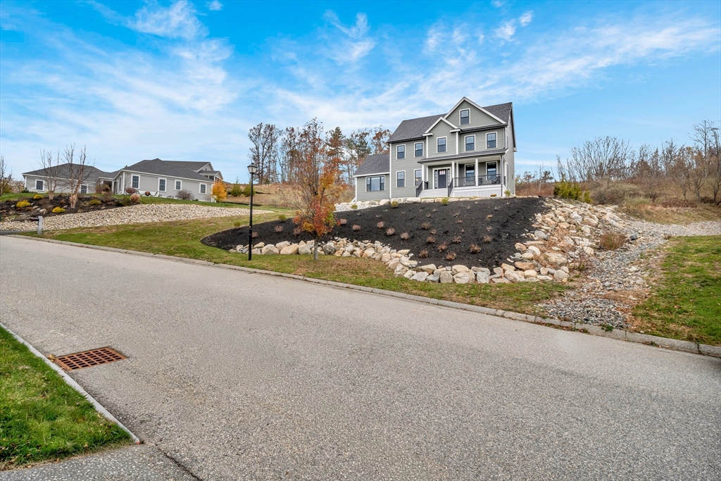 122 Seven Sister Road Haverhill, MA 01830 - Photo 30 of 33 a front view of a house with a yard