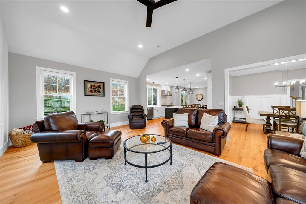 122 Seven Sister Road Haverhill, MA 01830 - Photo 3 of 33 a living room with furniture a large window and a rug