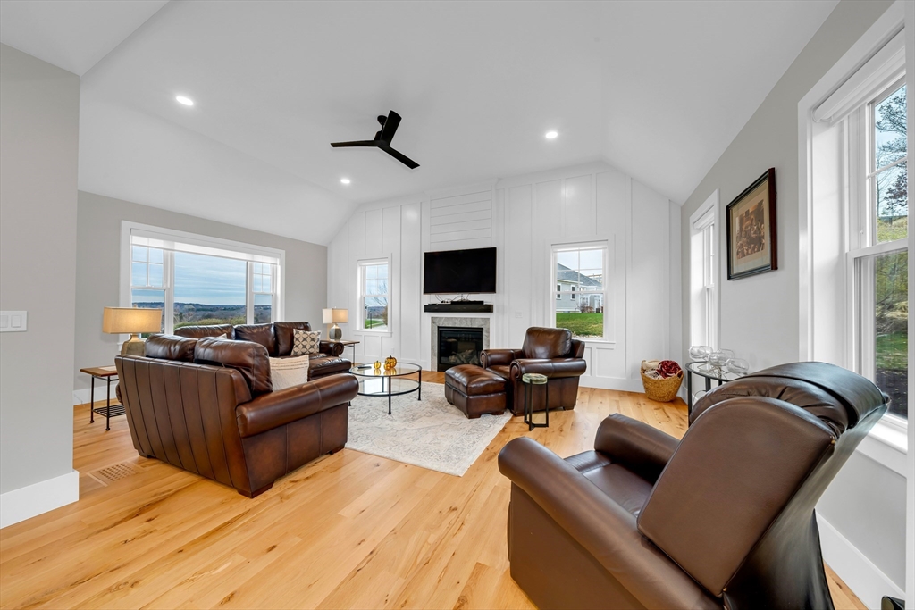 122 Seven Sister Road Haverhill, MA 01830 - Photo 4 of 33 a living room with furniture and a flat screen tv