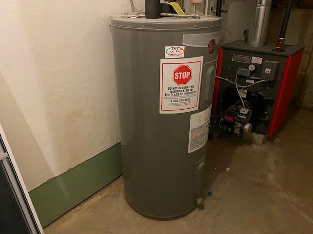 141 East County Road, Unit 141 Rutland, MA 01543 - Photo 23 of 27 a view of water heater room