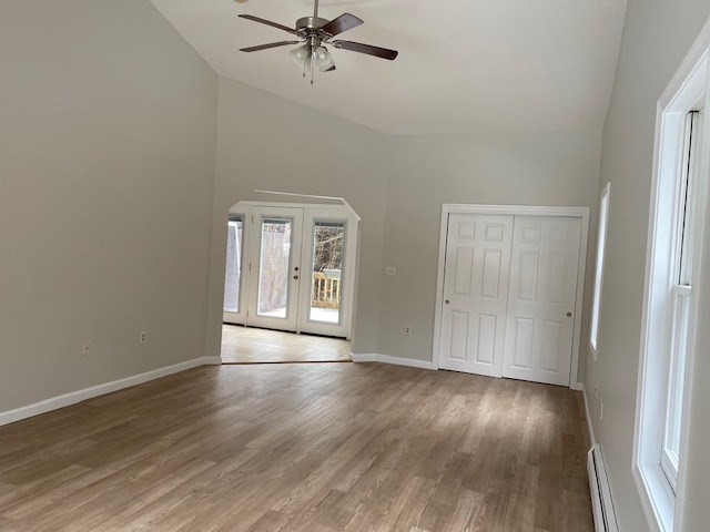 141 East County Road, Unit 141 Rutland, MA 01543 - Photo 7 of 27 wooden floor in an empty room with a window