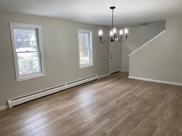 141 East County Road, Unit 141 Rutland, MA 01543 - Photo 10 of 27 a view of an empty room with a window