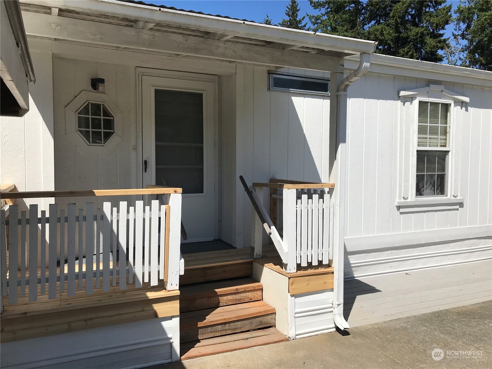 600 Northeast Lincoln Road, Unit 30 Poulsbo, WA 98370 - Photo 2 of 14 a view of entryway with a front door