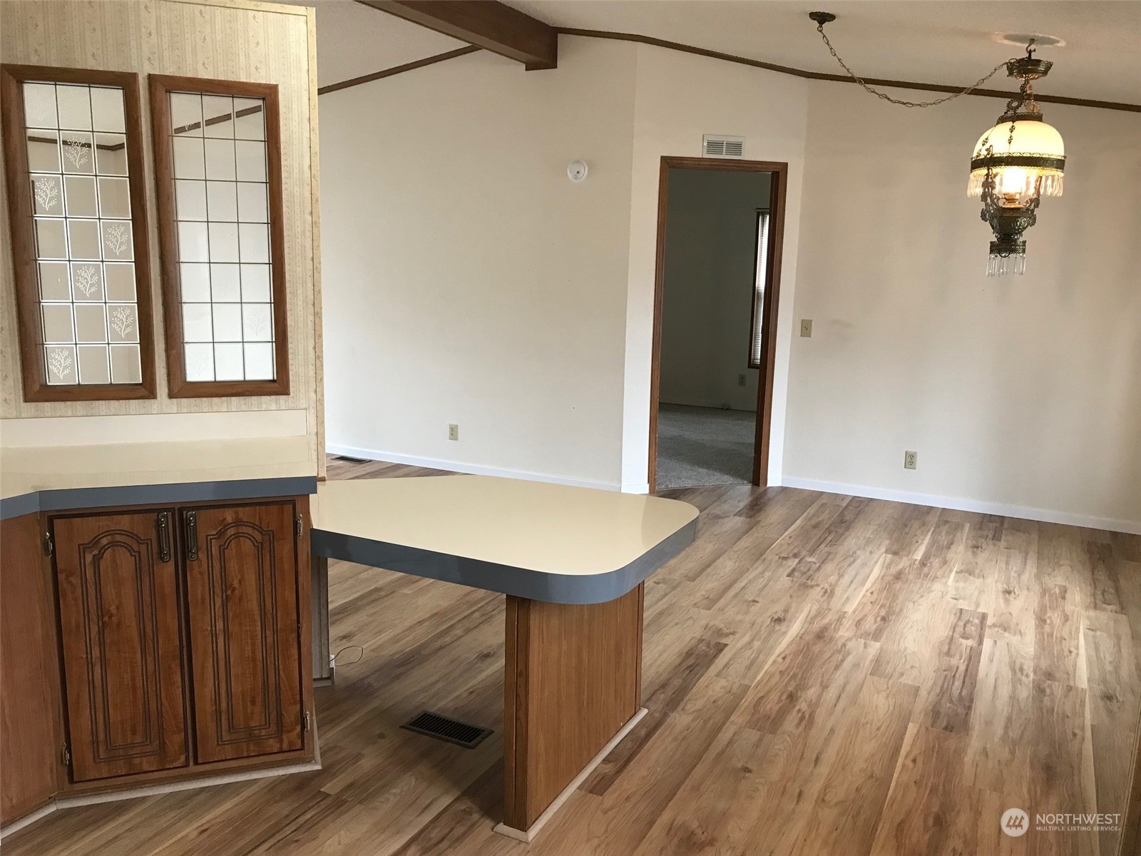 600 Northeast Lincoln Road, Unit 30 Poulsbo, WA 98370 - Photo 10 of 14 an entryway with wooden floor and cabinet