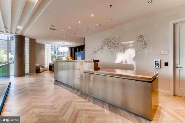 a gym hall with exercise machine and room