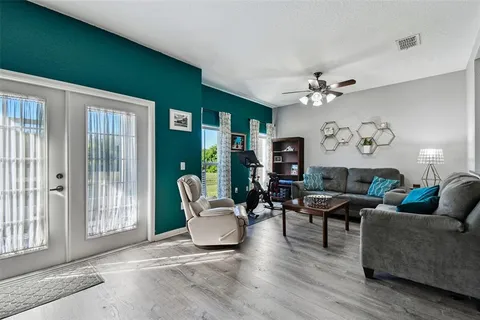 a living room with furniture and a window