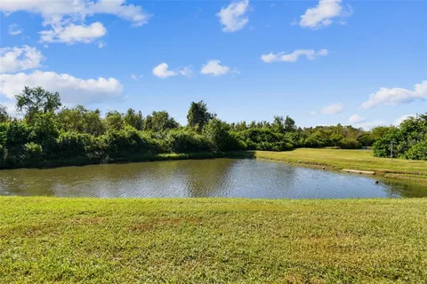 a view of an ocean and city