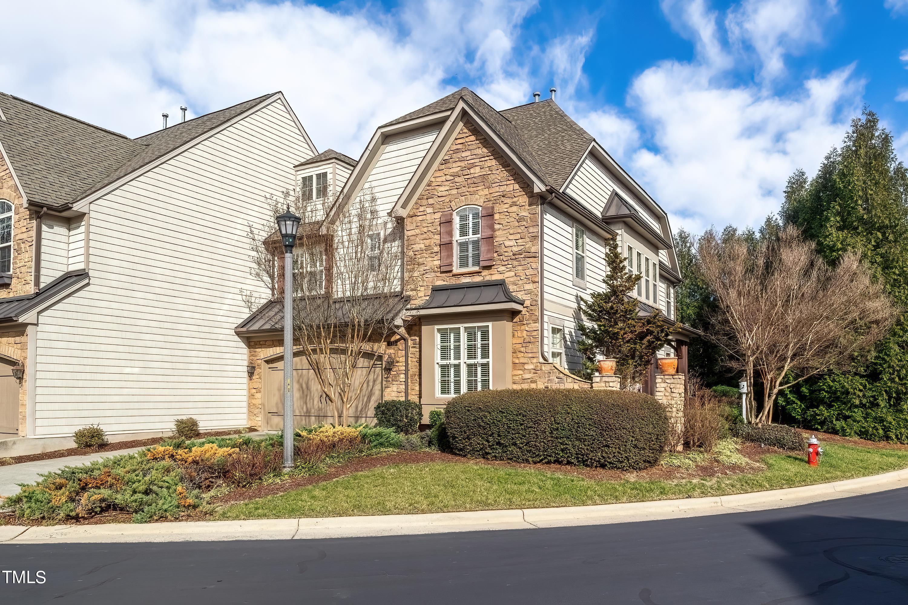 133 Sunstone Drive Cary, NC 27519 - Photo 2 of 37 a front view of a house with garden