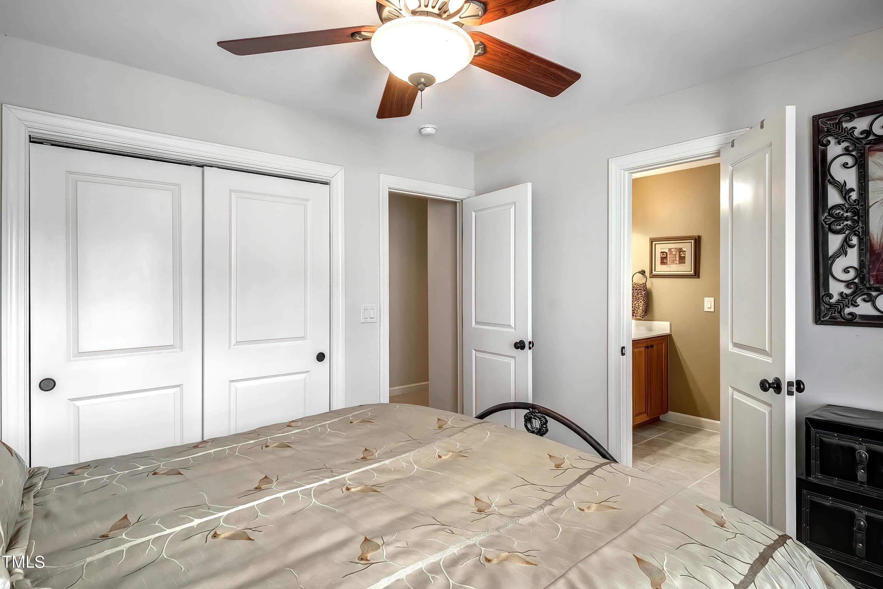 133 Sunstone Drive Cary, NC 27519 - Photo 26 of 37 a view of a bedroom with a bed and hallway