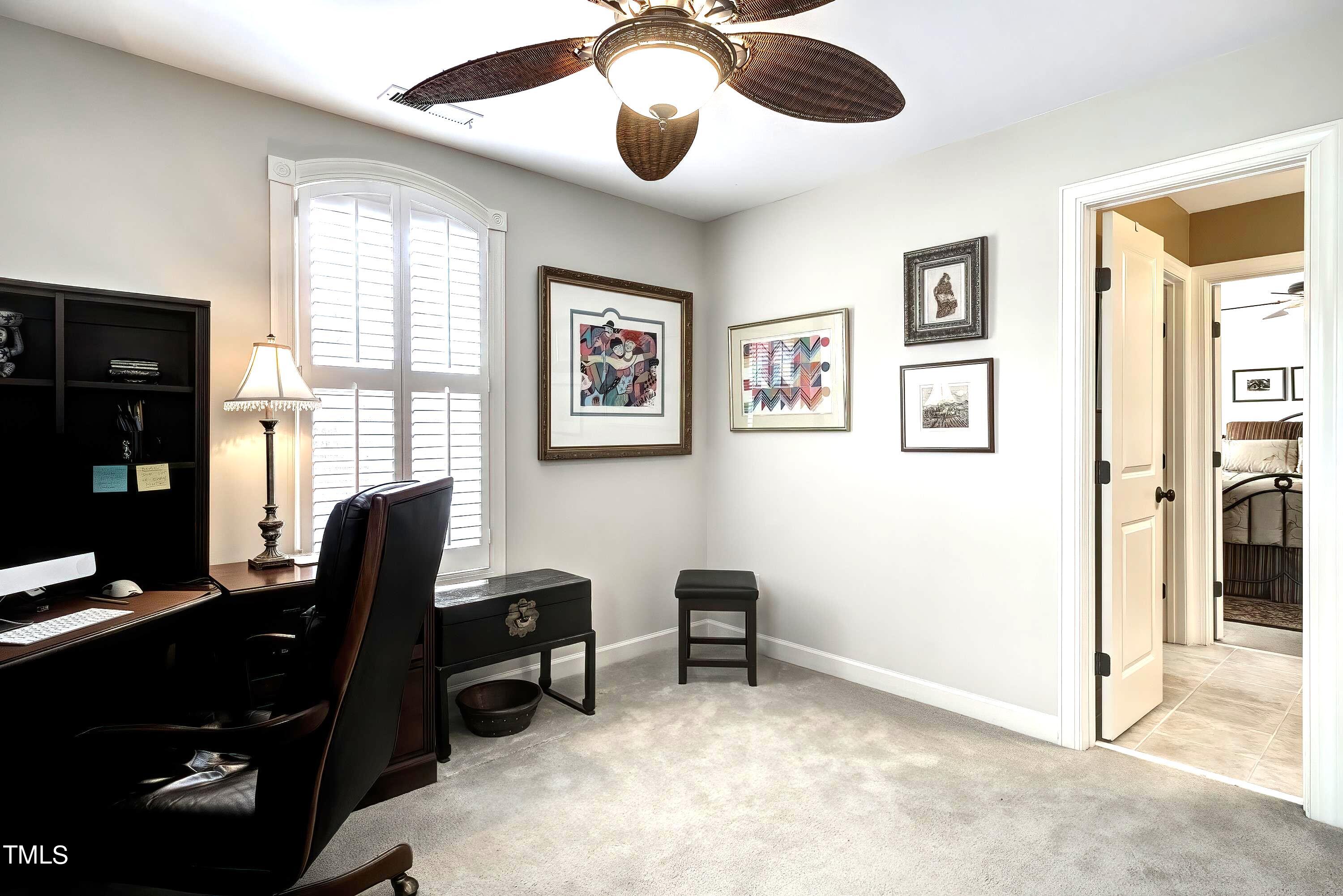 133 Sunstone Drive Cary, NC 27519 - Photo 30 of 37 a view of a workspace with furniture and a window