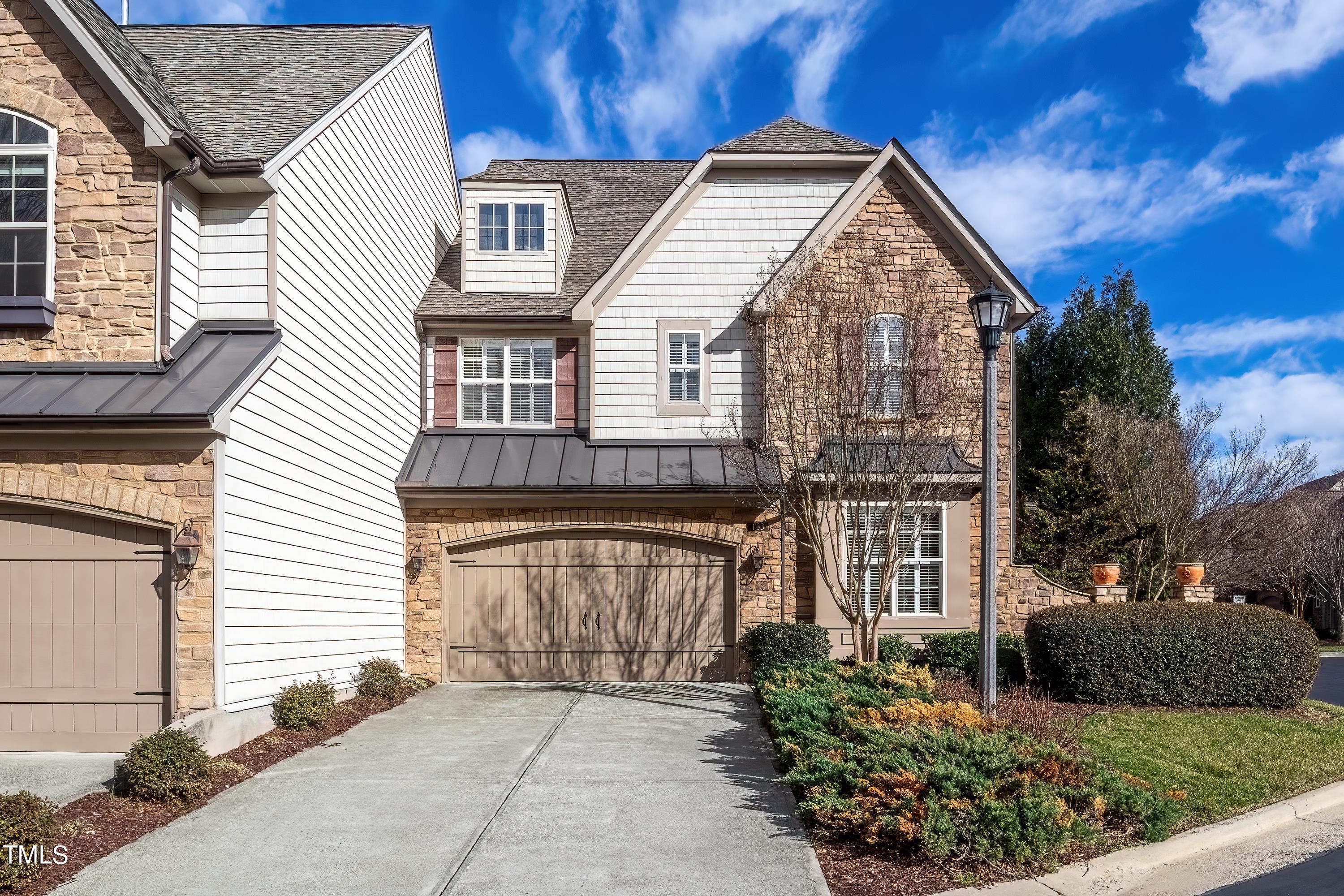 133 Sunstone Drive Cary, NC 27519 - Photo 3 of 37 a view of a house with brick walls