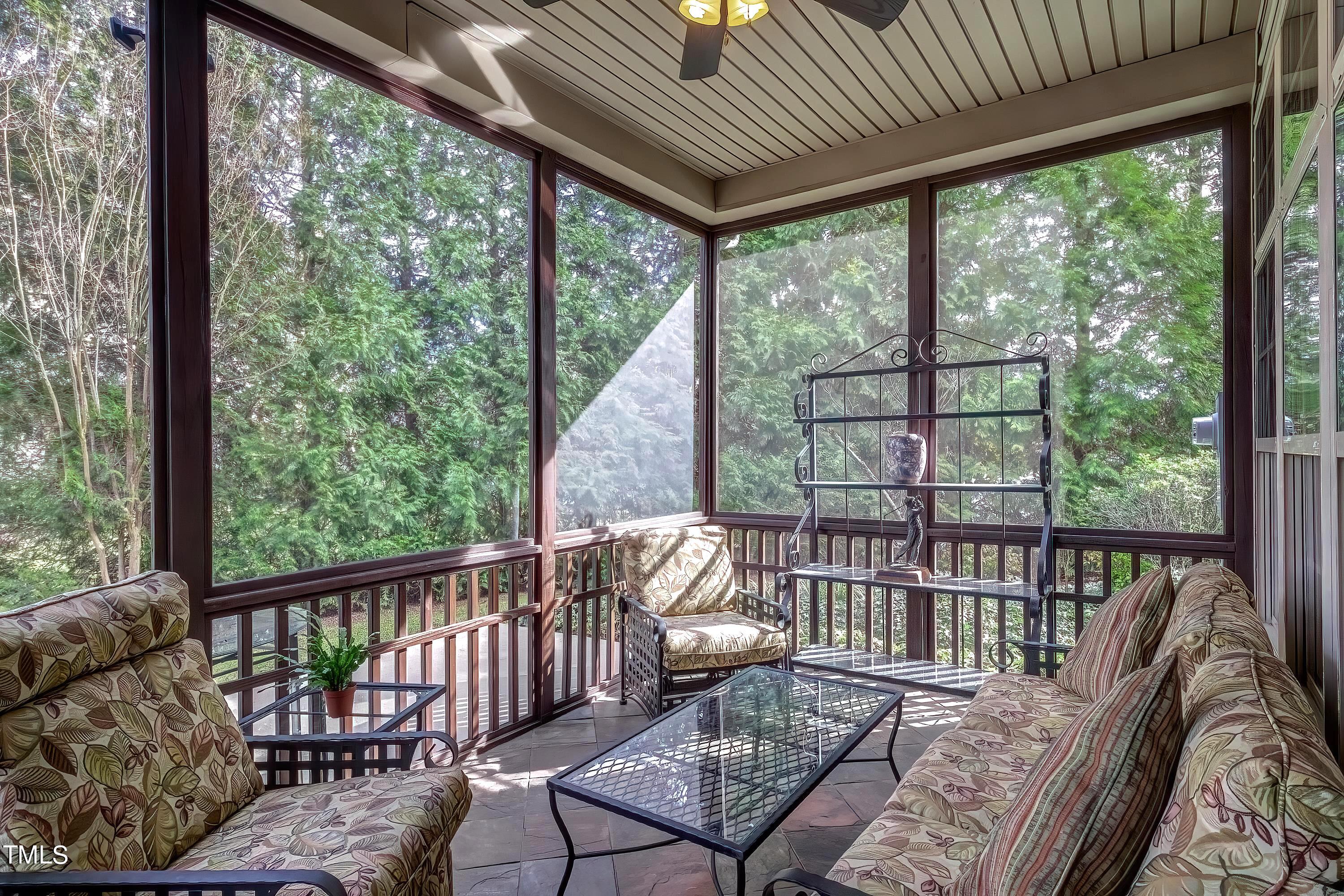 133 Sunstone Drive Cary, NC 27519 - Photo 33 of 37 a balcony with wooden floor and outdoor seating