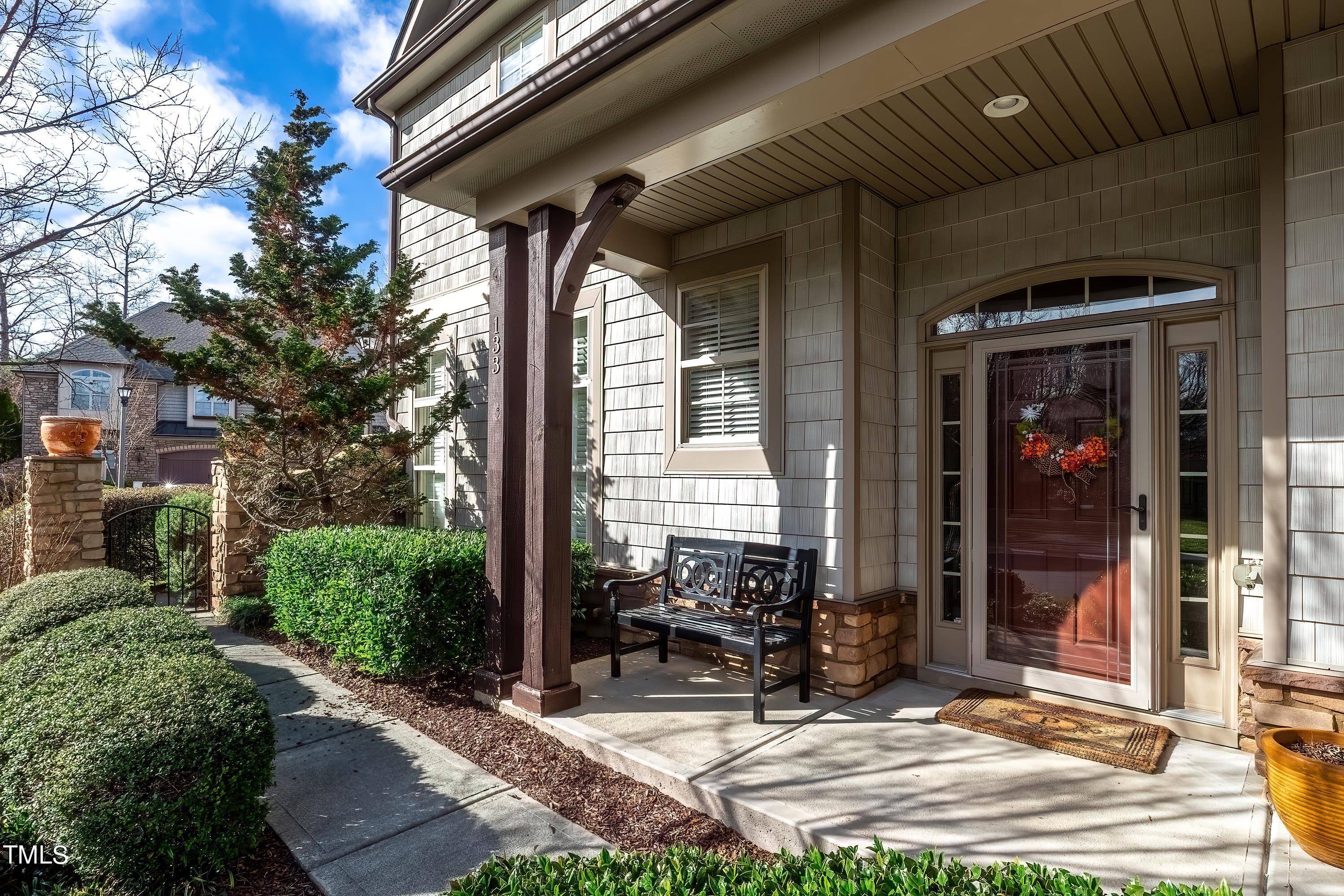 133 Sunstone Drive Cary, NC 27519 - Photo 5 of 37 a view of house with backyard outdoor seating and trees