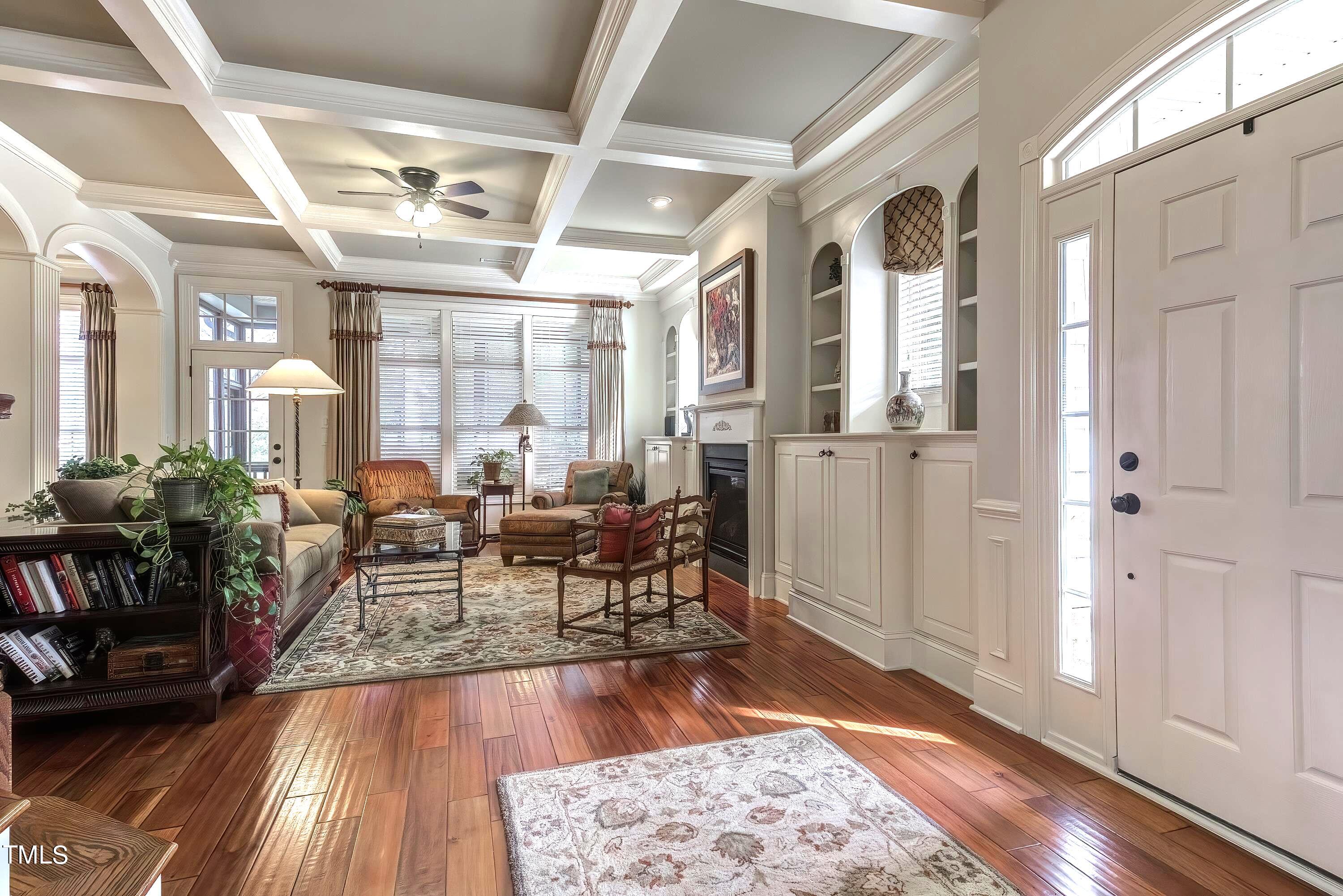 133 Sunstone Drive Cary, NC 27519 - Photo 6 of 37 a living room with furniture and wooden floor