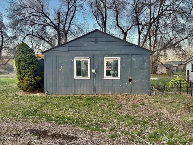 a house with trees in front of it
