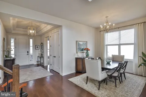 a bathroom with a double vanity sink and mirror