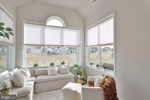 a kitchen with a stove a sink and a refrigerator