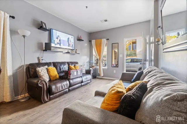 a living room with furniture and a couch