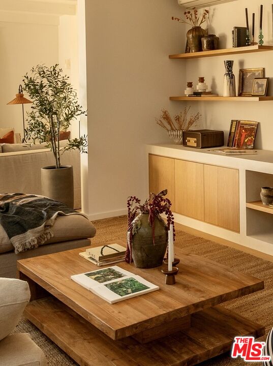 31376 Broad Beach Road Malibu, CA 90265 - Photo 11 of 32 a room with furniture and wooden floor