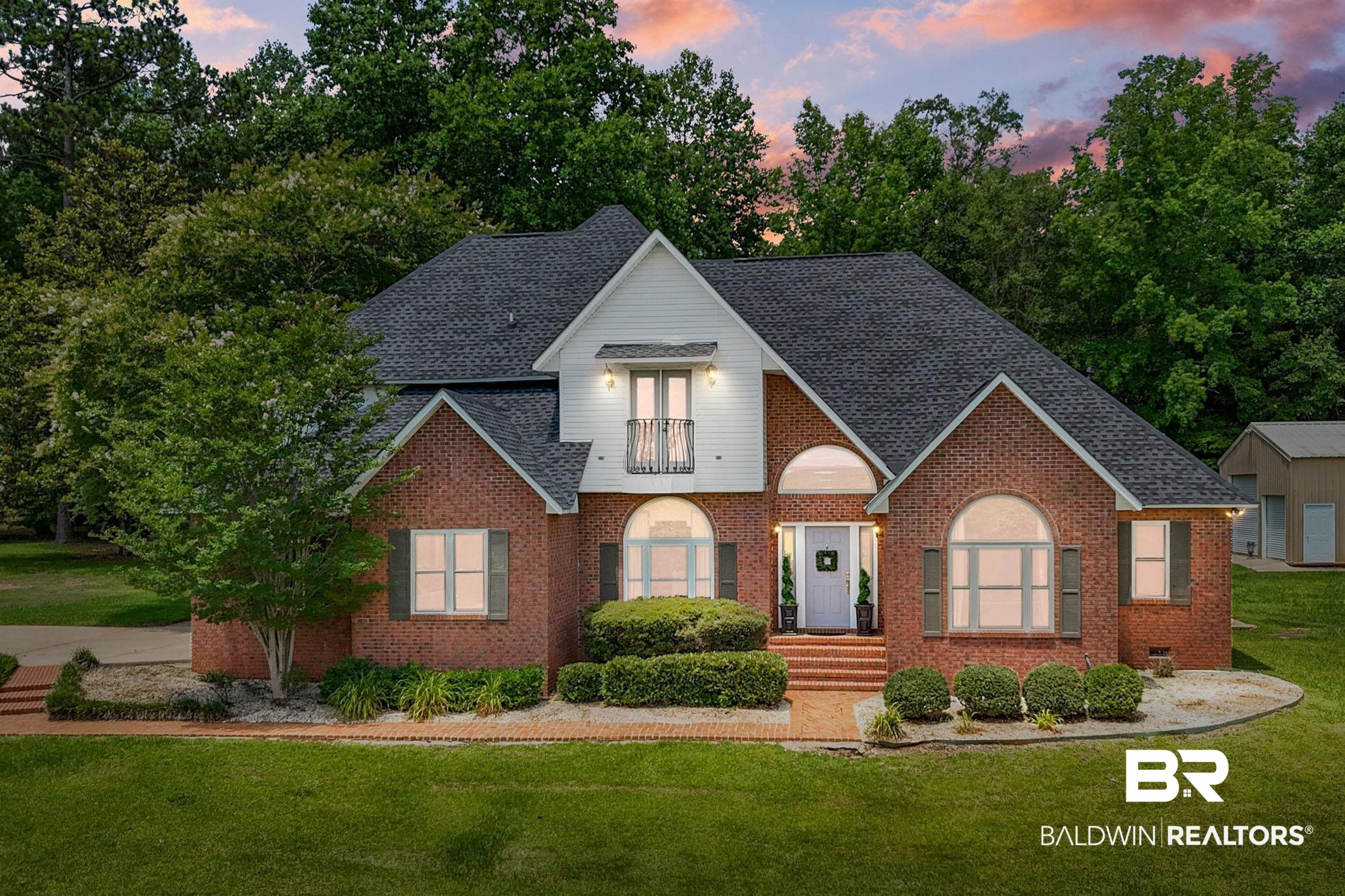 196 Morning Ridge Road Monroeville, AL 36460 - Photo 1 of 71 View of front of property with a front yard, a shingled roof, and brick siding