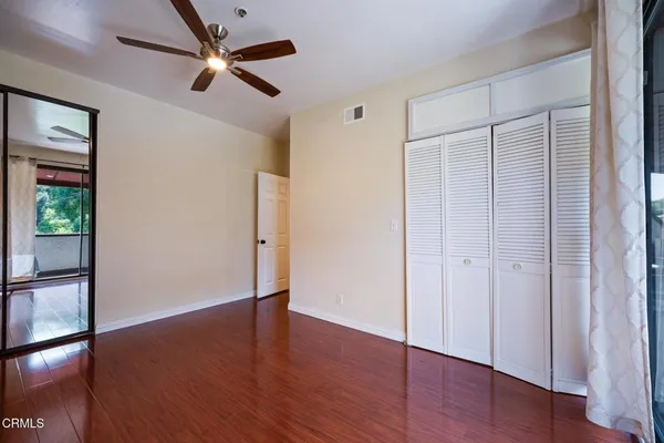 a view of a hallway with washer and dryer
