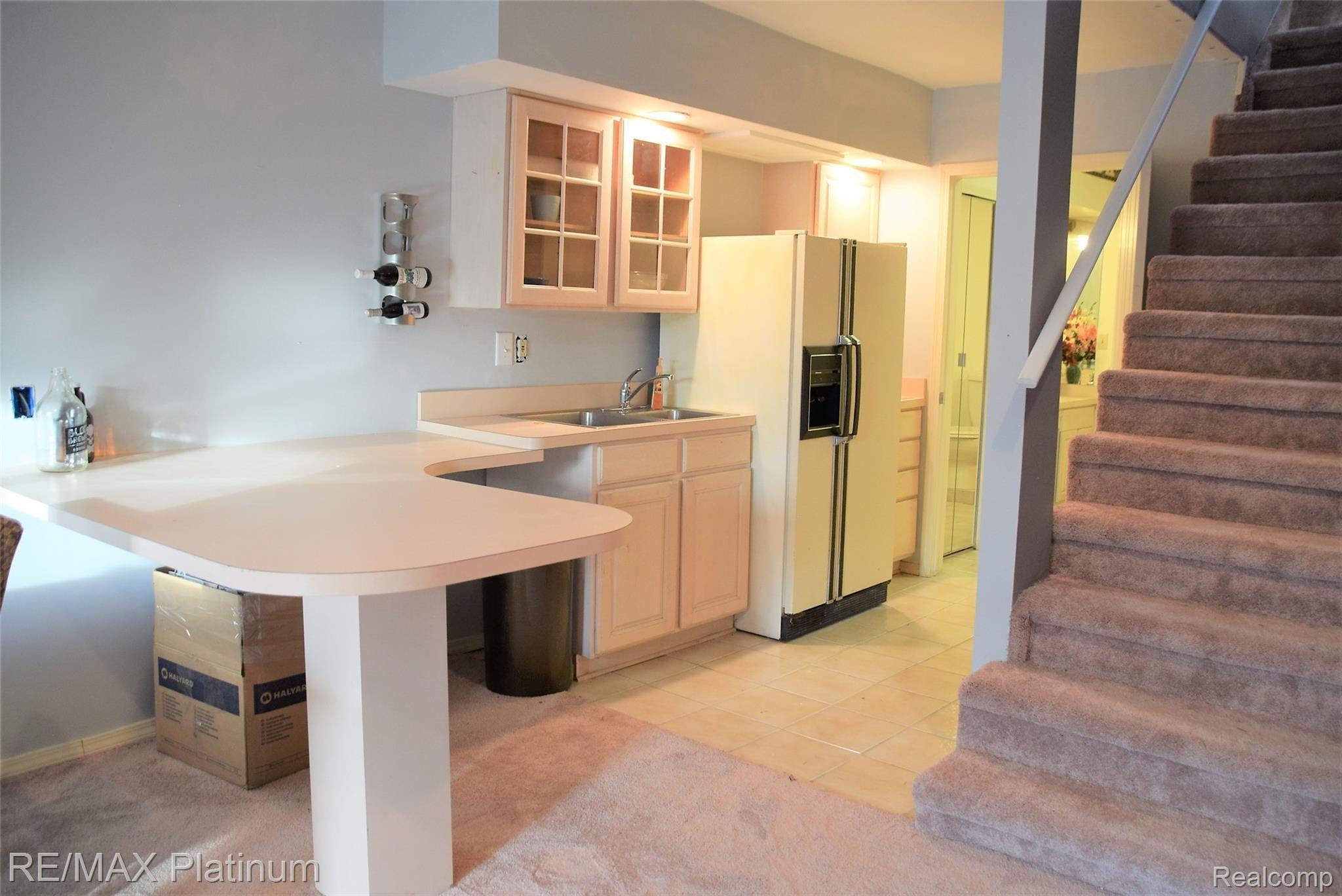 310 North Eager Road Howell, MI 48843 - Photo 25 of 35 basement kitchen.JPG