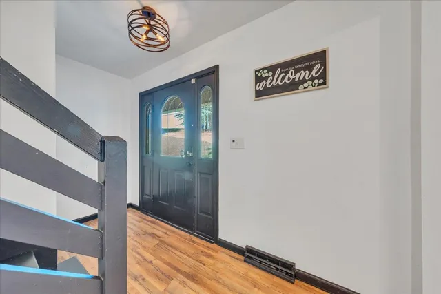 a view of a hallway with entryway