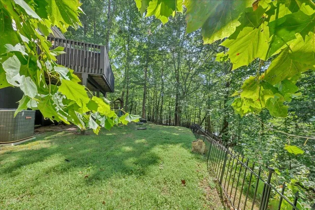 a backyard of a house with lots of green space