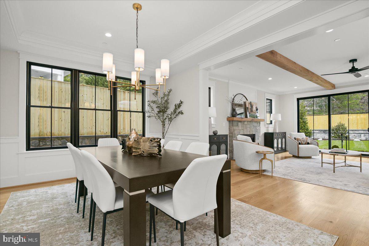 204 Oxford Street Chevy Chase, MD 20815 - Photo 22 of 59 a view of a dining room with furniture window and outside view