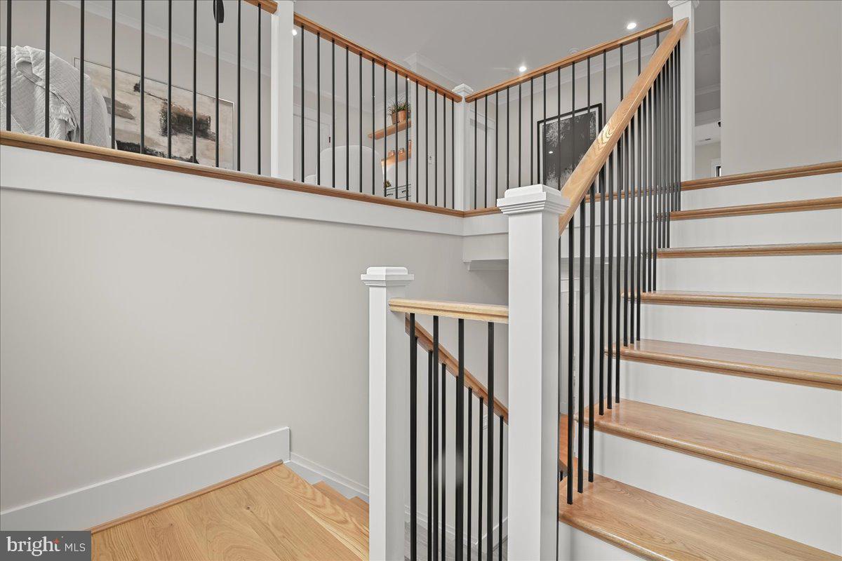 204 Oxford Street Chevy Chase, MD 20815 - Photo 30 of 59 a view of staircase with railing and white walls