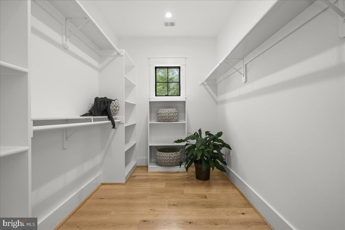204 Oxford Street Chevy Chase, MD 20815 - Photo 44 of 59 a view of a hallway to a livingroom with furniture