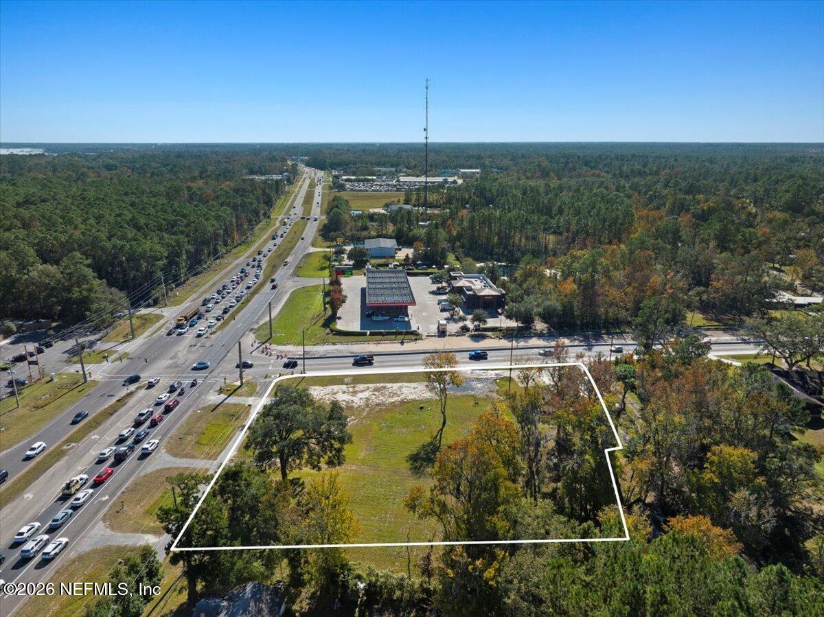 1456 Russell Road Green Cove Springs, FL 32043 - Photo 7 of 15 a view of a swimming pool with a lake view