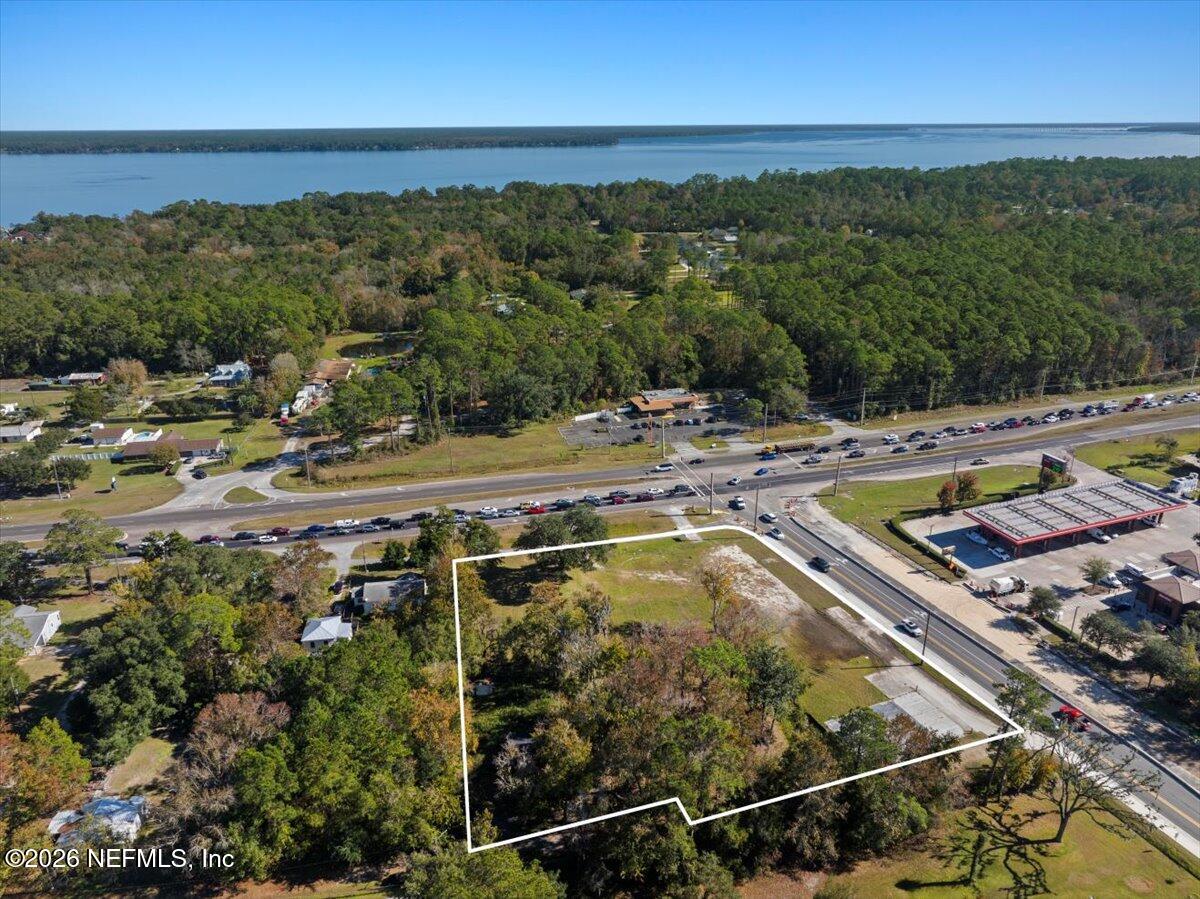 1456 Russell Road Green Cove Springs, FL 32043 - Photo 8 of 15 a view of a swimming pool with a yard