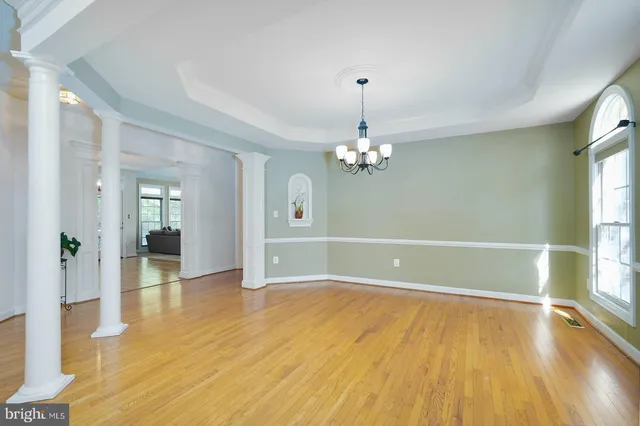 a view of balcony with deck and wooden floor