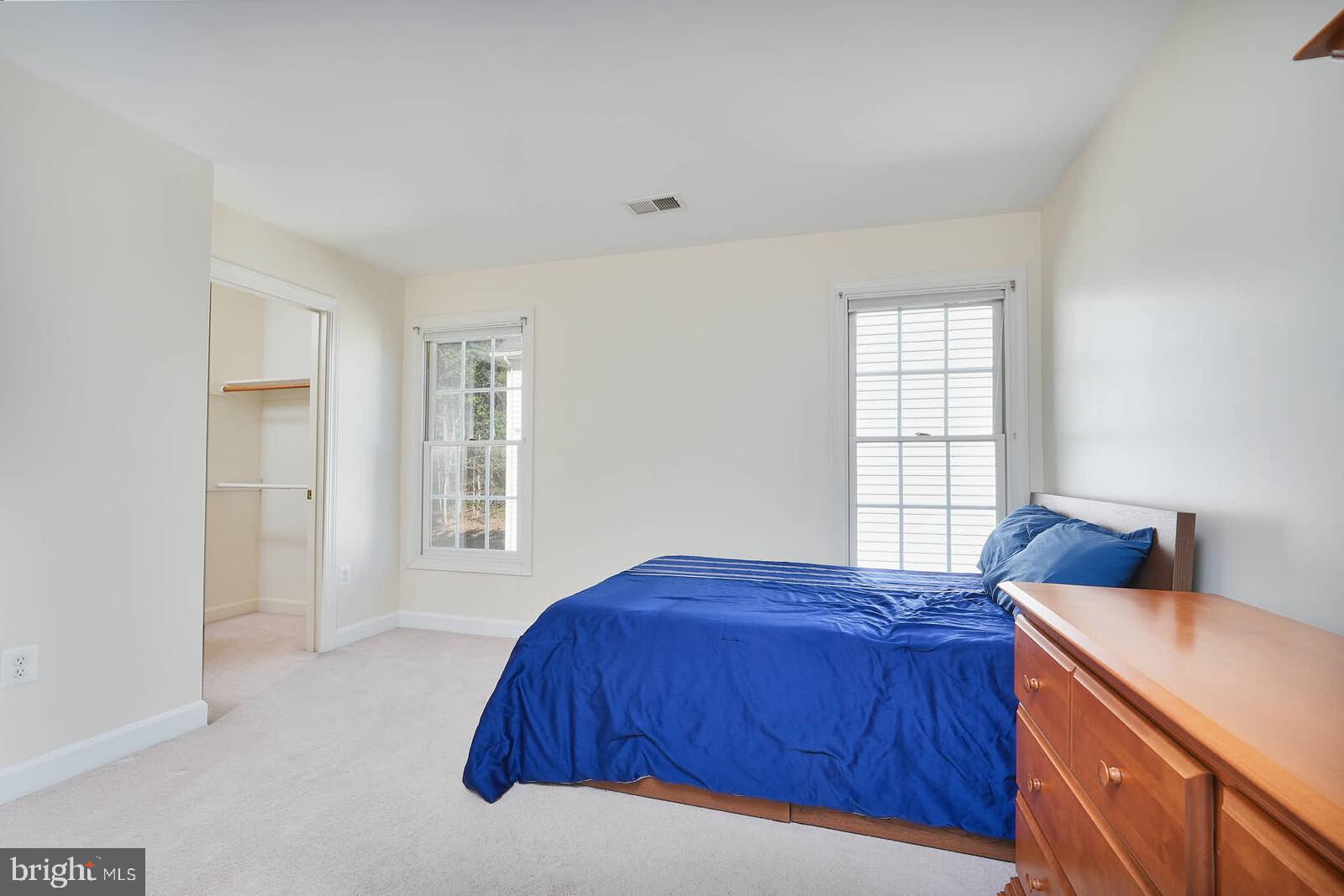 13014 English Turn Drive Silver Spring, MD 20904 - Photo 39 of 62 a bedroom with a bed and window
