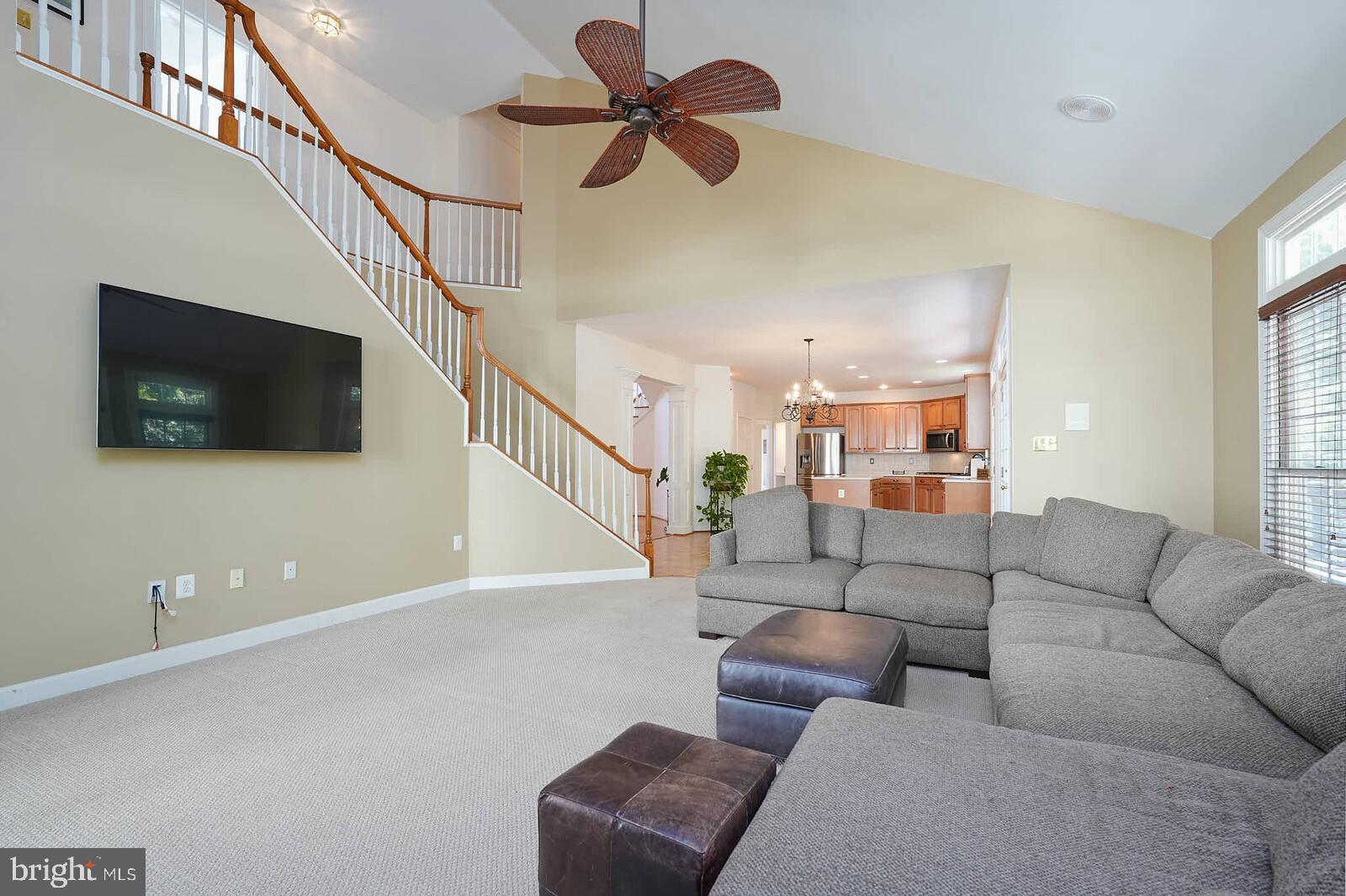 13014 English Turn Drive Silver Spring, MD 20904 - Photo 5 of 62 a living room with furniture and a flat screen tv