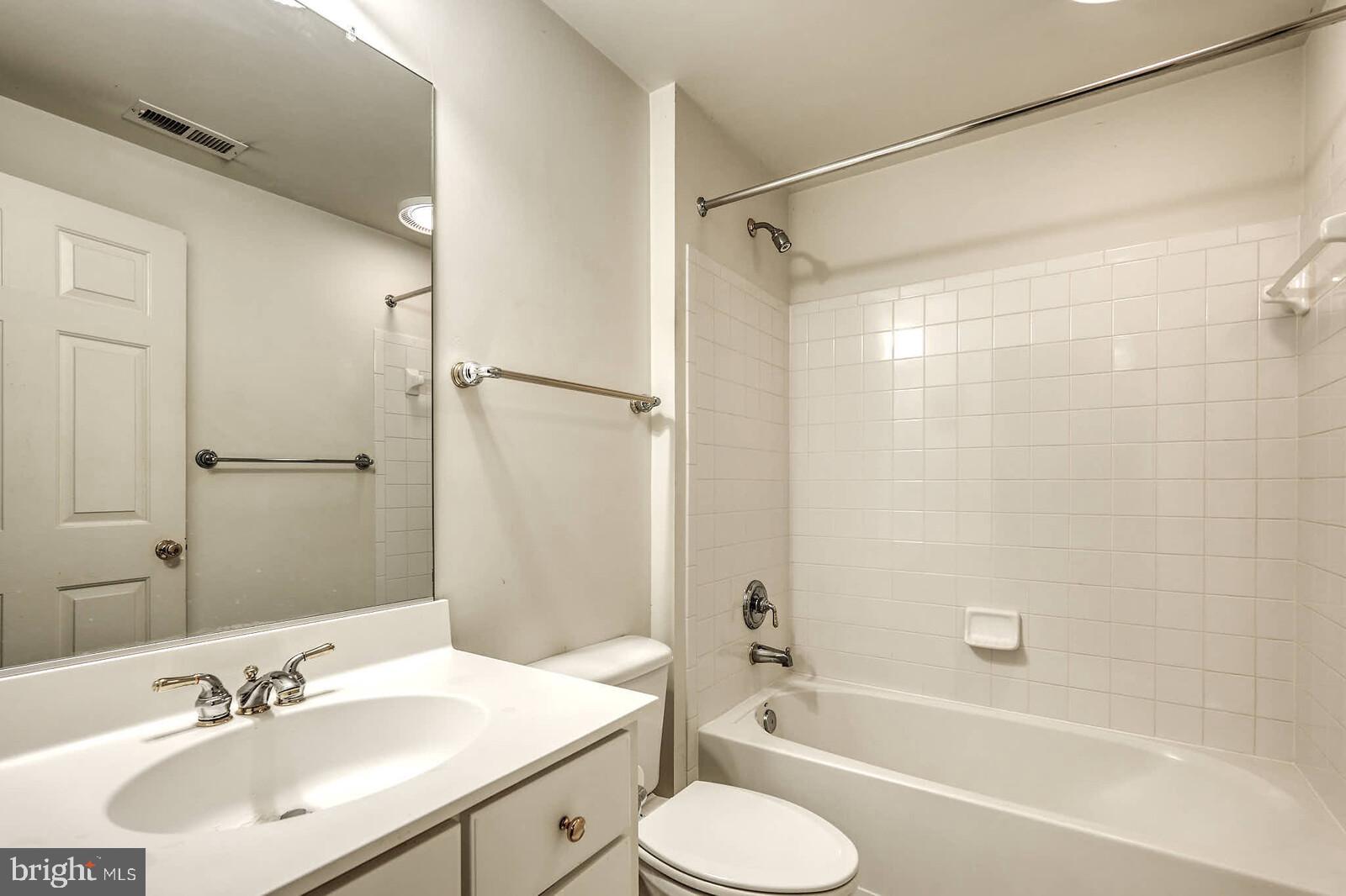 13014 English Turn Drive Silver Spring, MD 20904 - Photo 52 of 62 a bathroom with a sink toilet tub and shower