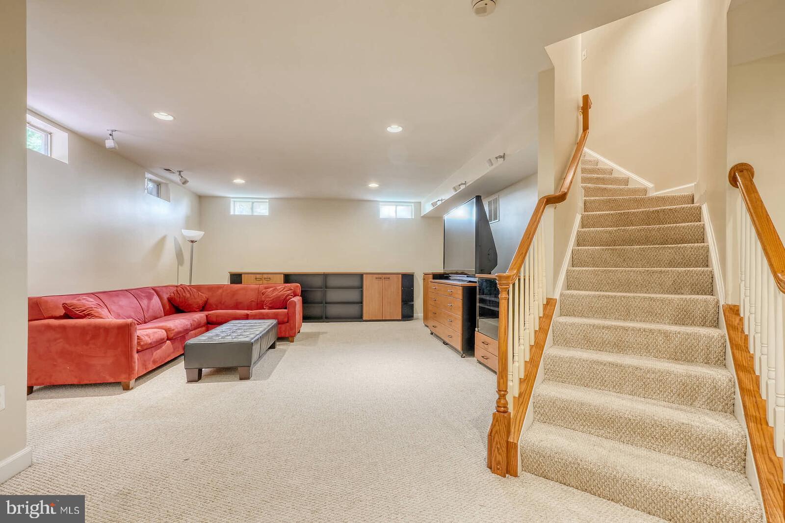 13014 English Turn Drive Silver Spring, MD 20904 - Photo 7 of 62 a living room with furniture and stairs