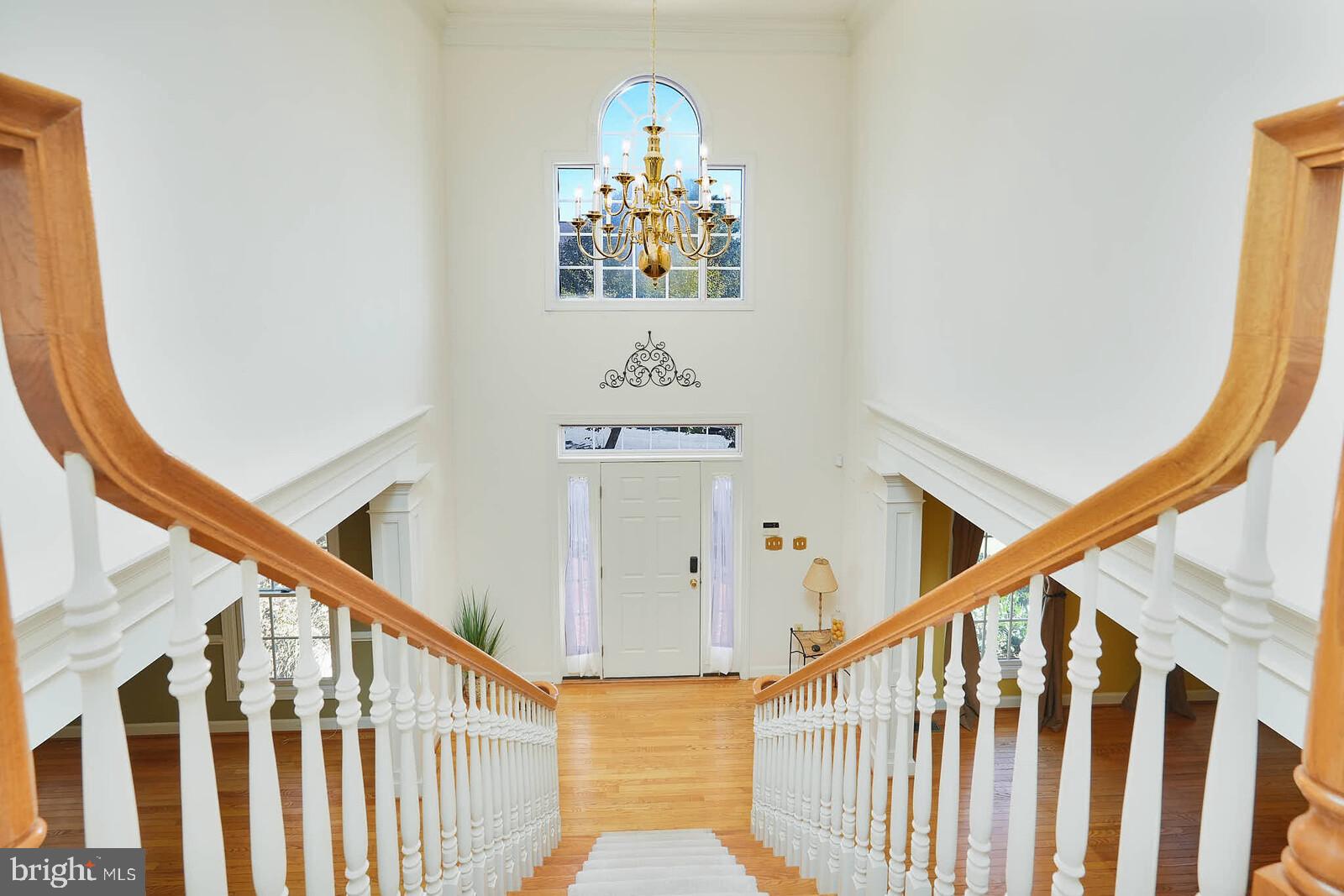 13014 English Turn Drive Silver Spring, MD 20904 - Photo 10 of 62 a view of staircase with wooden floor