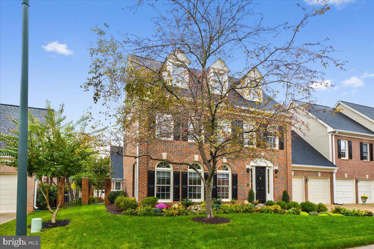 43501 Monarch Beach Square Leesburg, VA 20176 - Photo 2 of 43 front view of a brick house with a yard