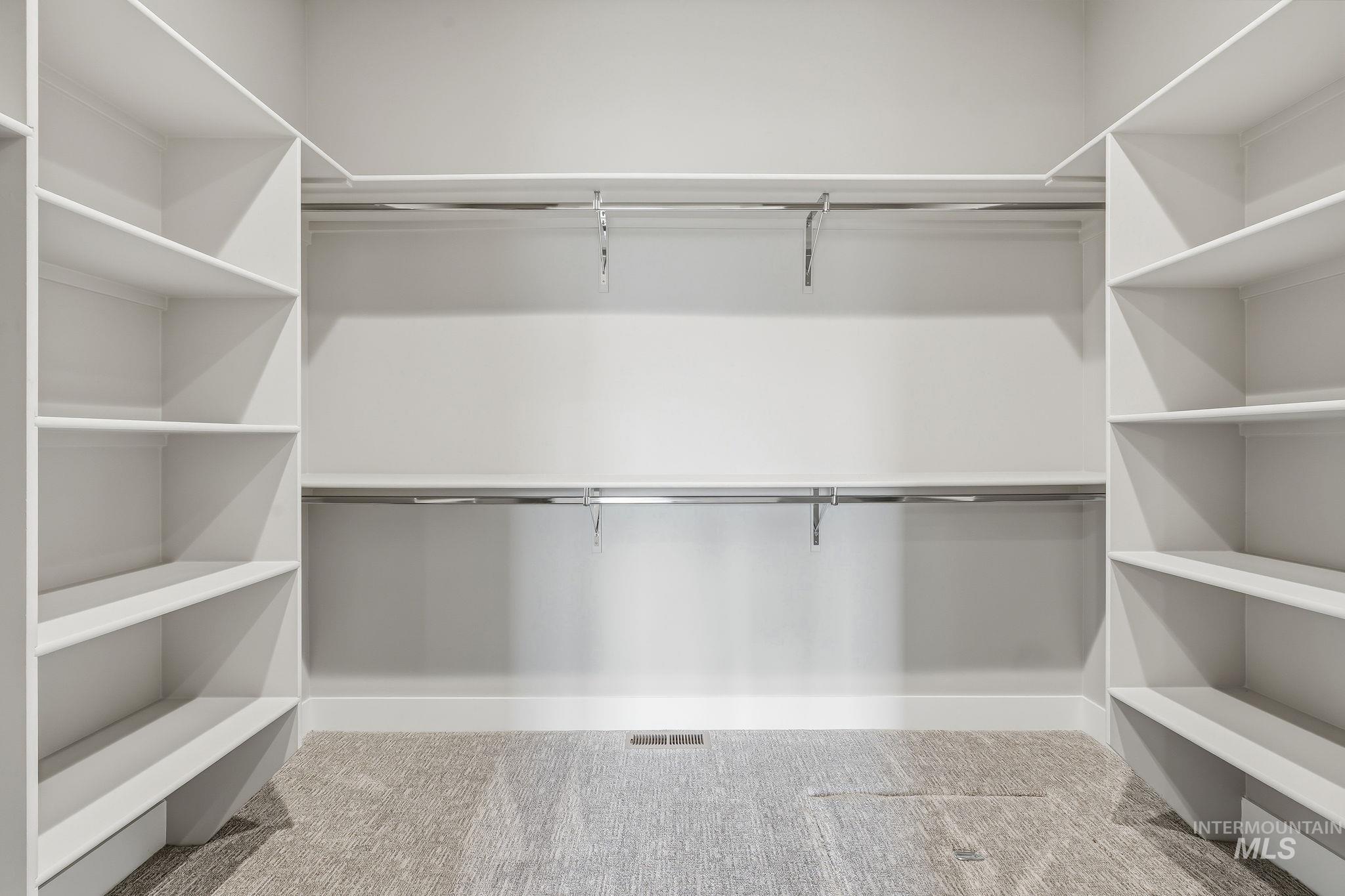470 South Radiator Way Boise, ID 83716 - Photo 41 of 50 Customizable closet system with built-in shelving and chrome hanging rods