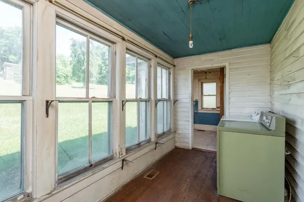 a bathroom with a sink and a window