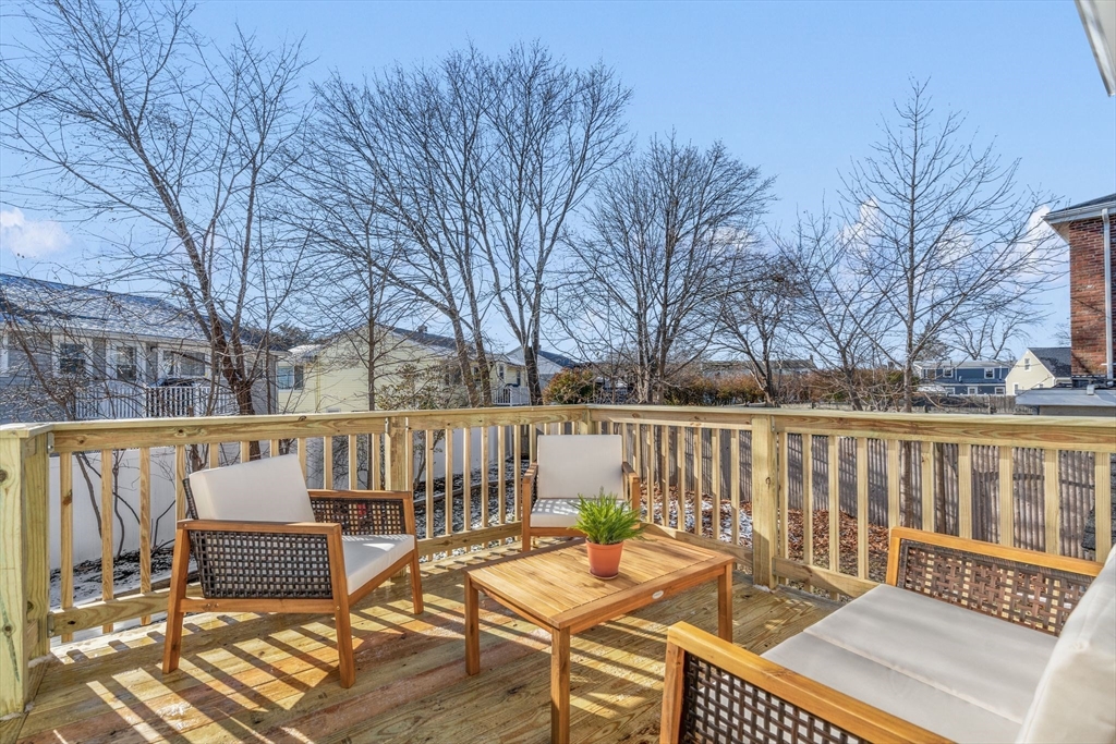 30 Coburn Street Hull, MA 02045 - Photo 22 of 39 a view of a chairs on the deck