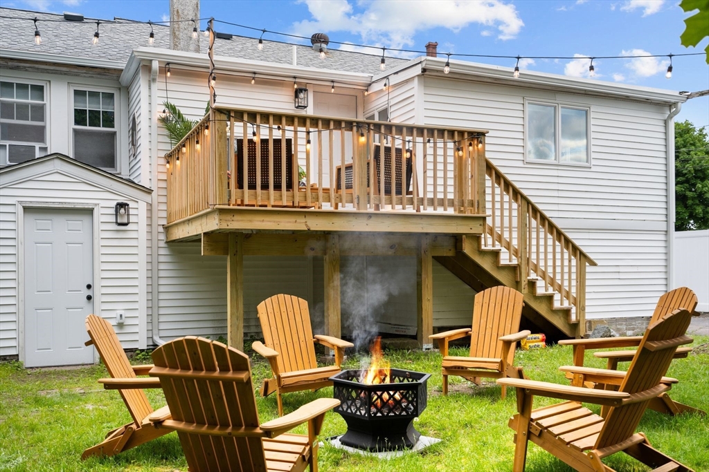 30 Coburn Street Hull, MA 02045 - Photo 9 of 39 a front view of a house with outdoor seating area