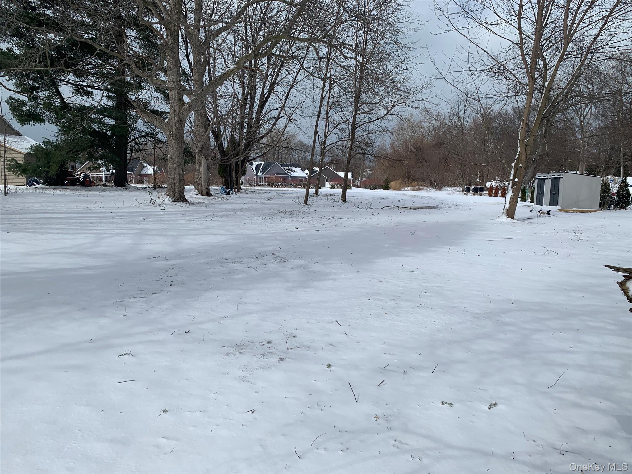 926 Klem Road Webster, NY 14580 - Photo 2 of 3 a view of road with covered with snow