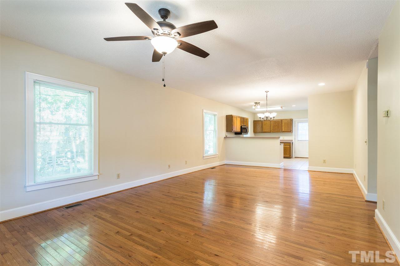 507 Pace Street Raleigh, NC 27604 - Photo 7 of 25 wooden floor in an empty room with a window