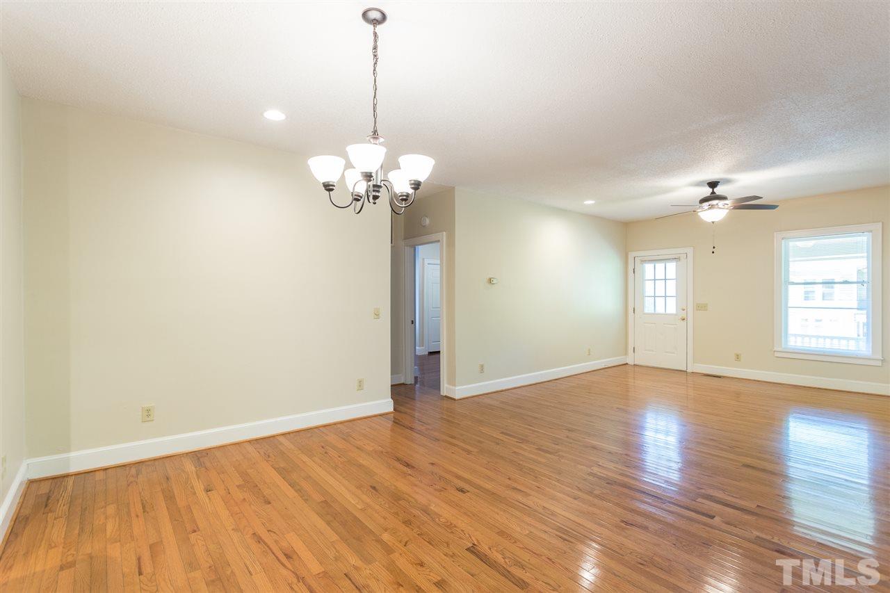 507 Pace Street Raleigh, NC 27604 - Photo 10 of 25 a view of an empty room with wooden floor and a window