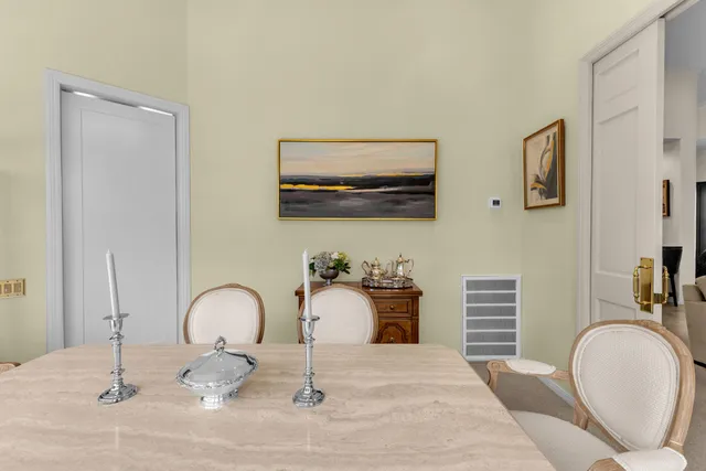 a kitchen with a stove a refrigerator and cabinets