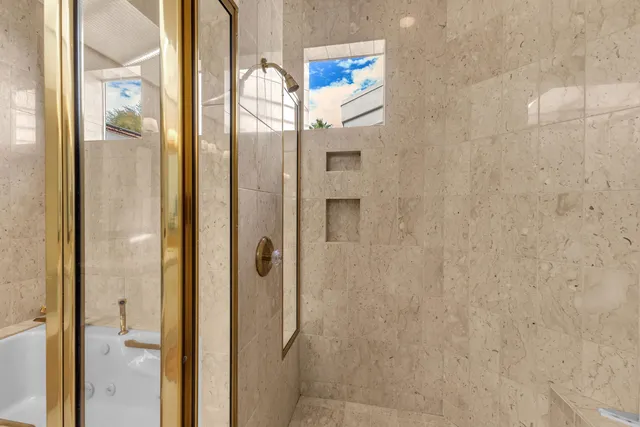 a bathroom with a sink a toilet and a bathtub